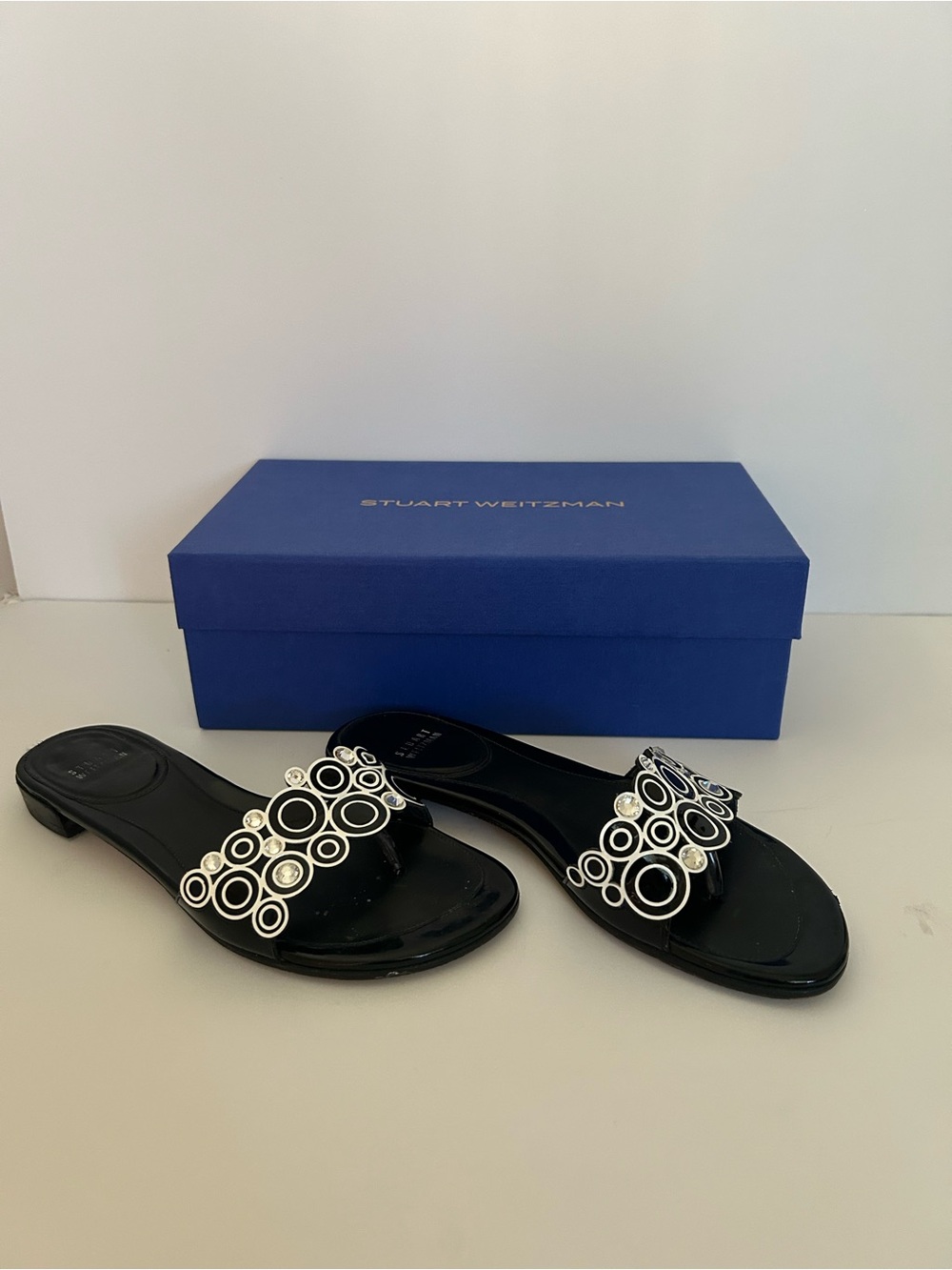 Stuart Weitzman Black Slip-On Mules with Silver Circle Embellishments